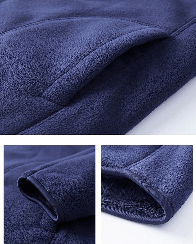 Close-up of navy blue women's reversible fleece jacket showcasing soft fabric texture and stylish design features.